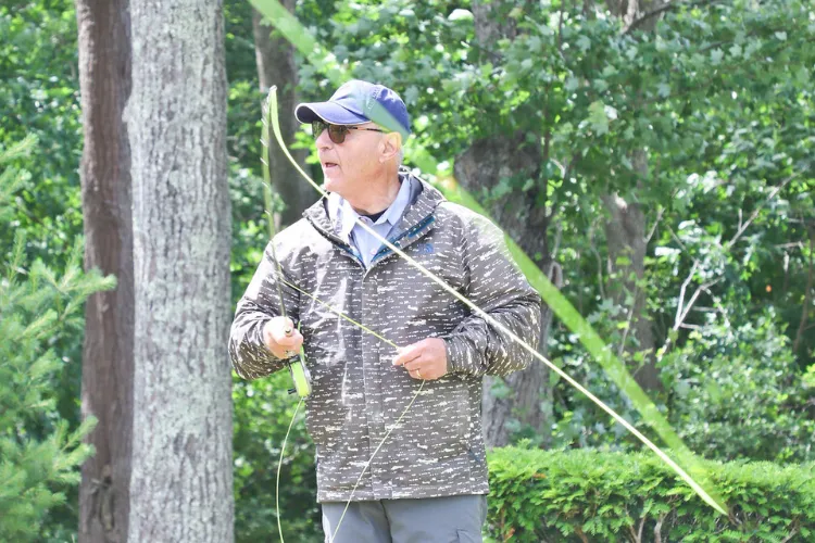 Man Preparing Fishing Line